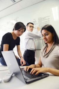 employees using laptop